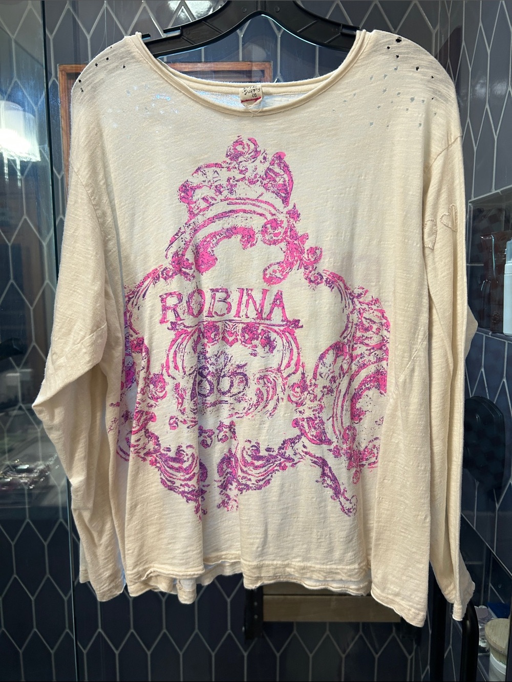 Magnolia Pearl Cream Long-Sleeve Tee with Pink and purple graphic 
writing on ba